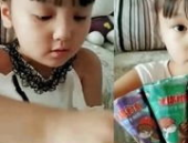 印度尼西亚小姐姐吃糖果,小姐姐甜蜜分享糖果时光